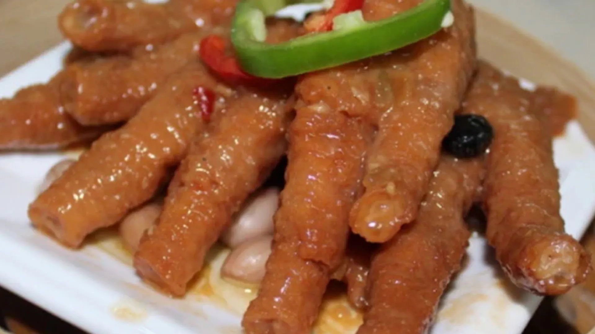 Braised chicken feet in savory sauce with peanuts and chili at Canto House, a Chinese restaurant in Philadelphia